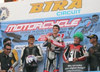 Ben Fortt, centre, celebrates his win in the 1000cc superbike rookie class event at Bira Circuit, Sunday, May 29.